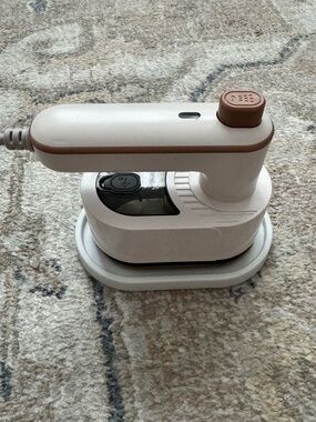 Compact White and Brown Handheld Garment Steamer Iron